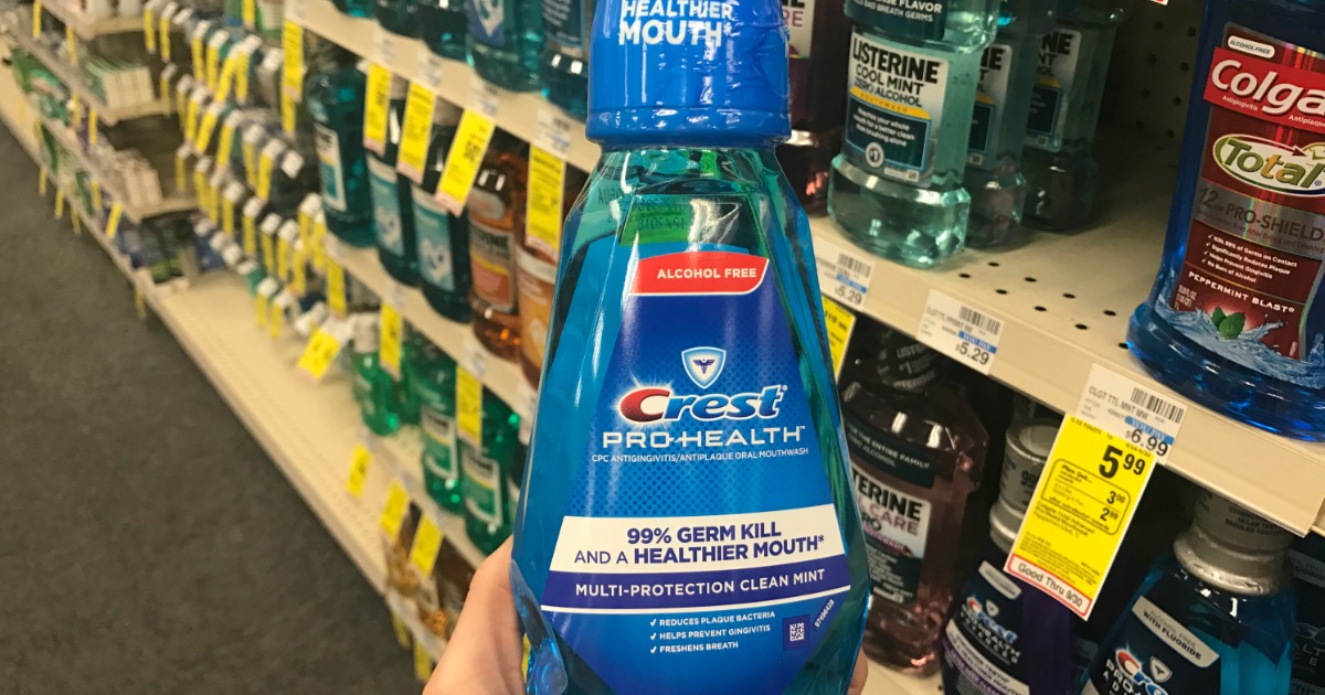 Hand holding mouthwash