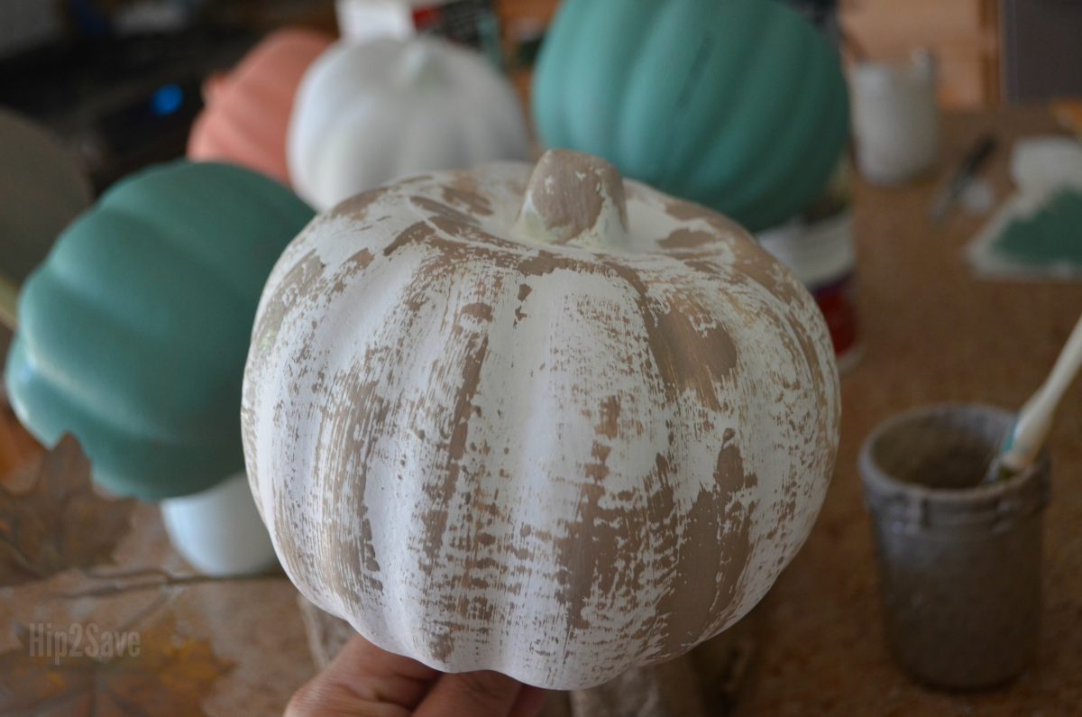 craft pumpkin covered in white and tan paint
