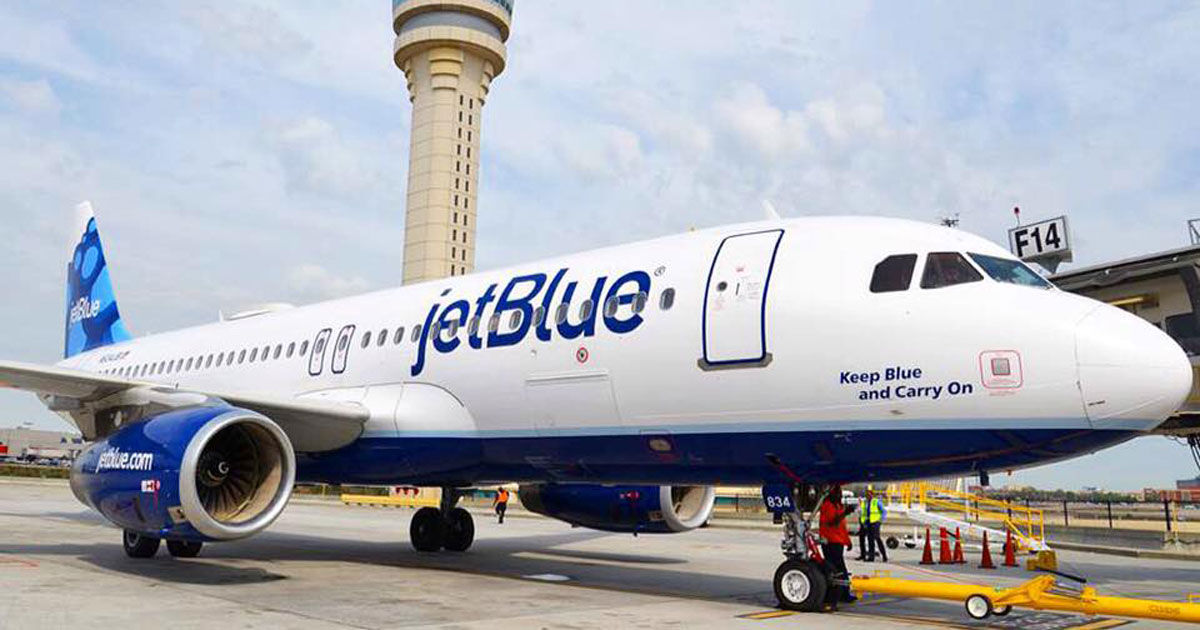 Money saving hacks and tips for booking airline flights – Jet Blue airplane on the tarmac