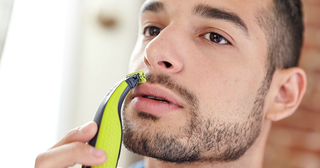 Man using Norelco OneBlade Electric Trimmer