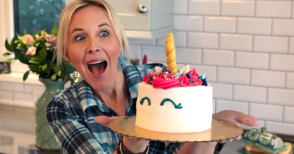 Collin with a unicorn birthday cake