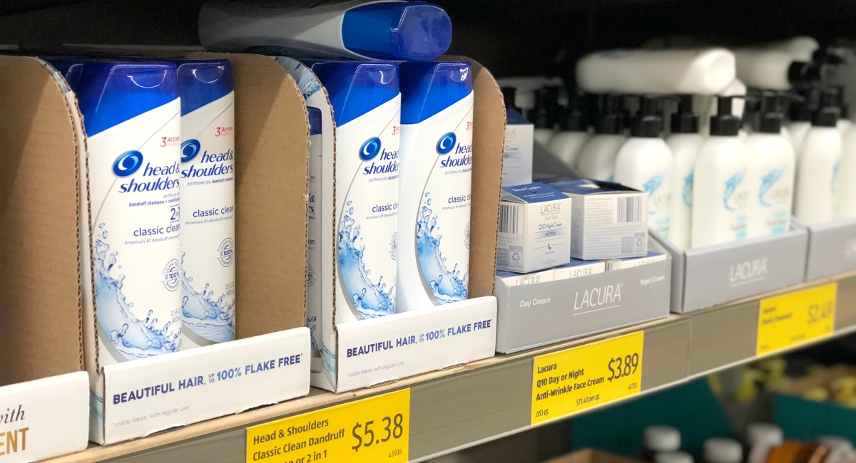 aldi shopping tips for personal care items on store shelf with yellow price tags