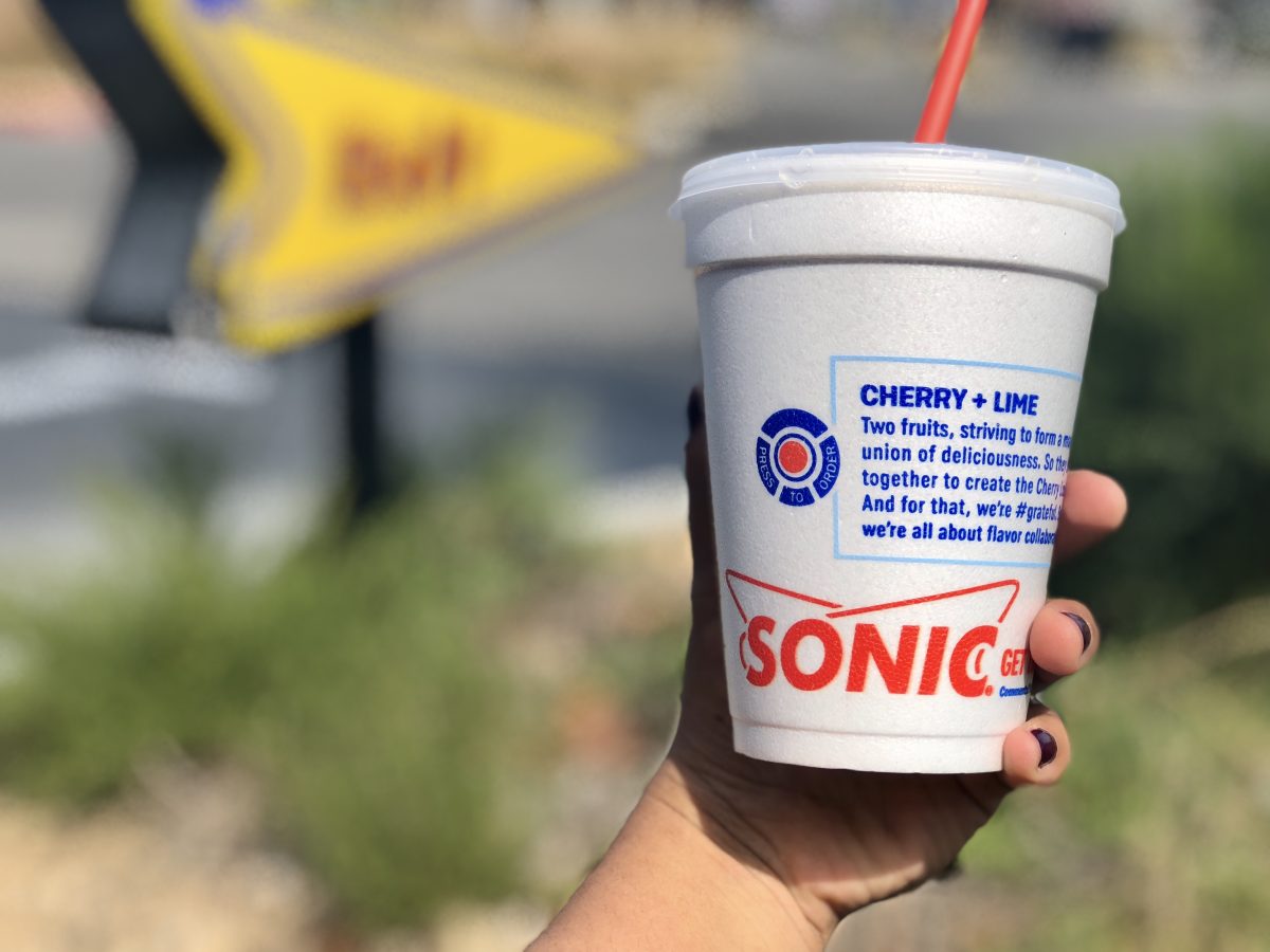 hand holding sonic slushie cup