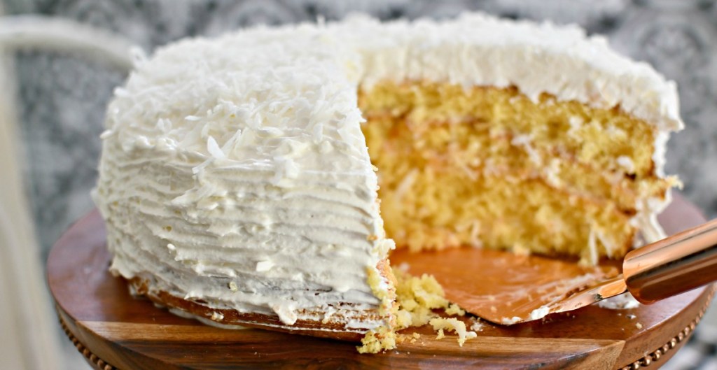 easy coconut cake on a cake stand