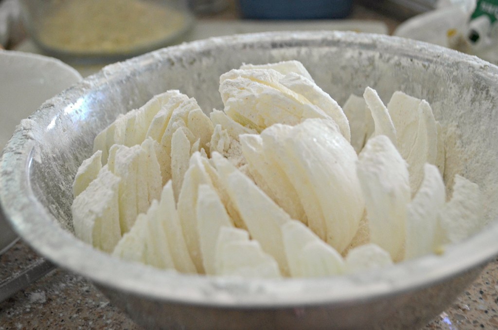 coating bloomin onion with flour'