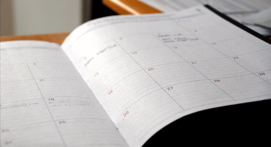 writing in calendar notebook