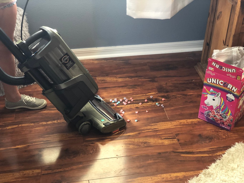 Shark APEX DuoClean vacuum review – cleaning up cereal on a wooden floor