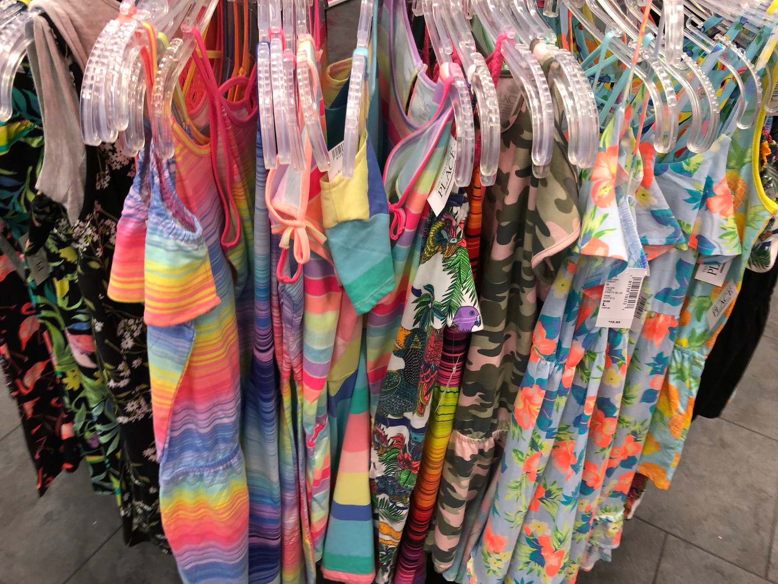 girls dresses on a rack in-store