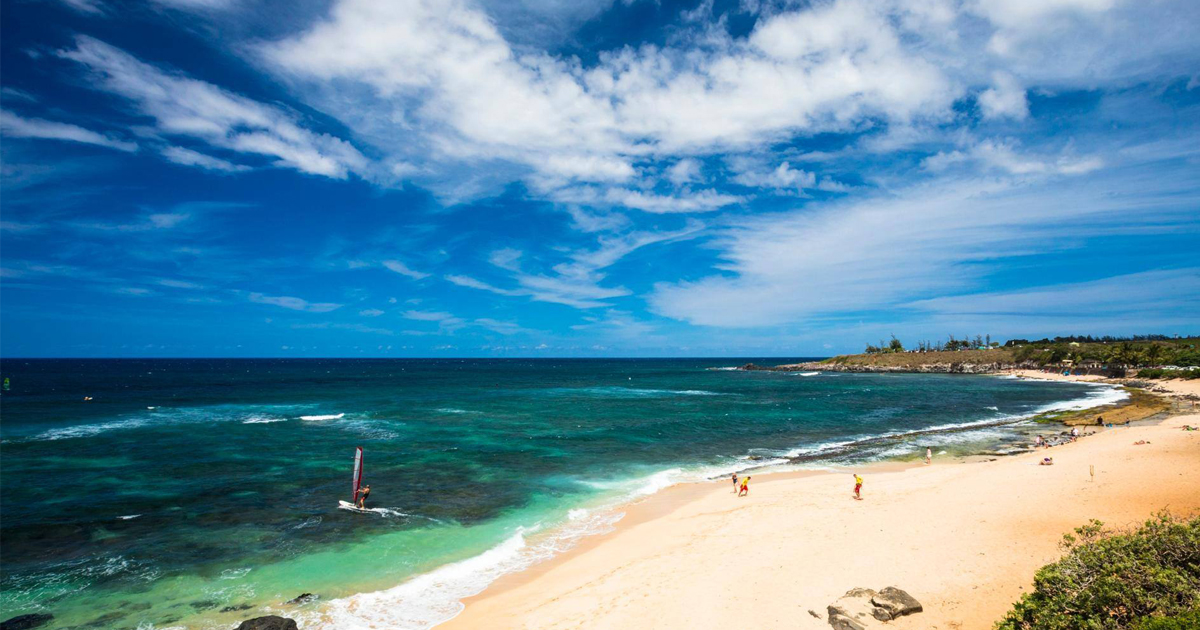 hawaiian beach with cloudy skies