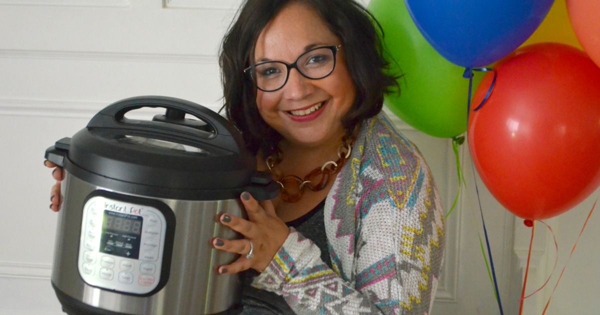 Hip2Save's Top 10 Recipe & DIY Posts of All Time –– Lina holding her instant pot