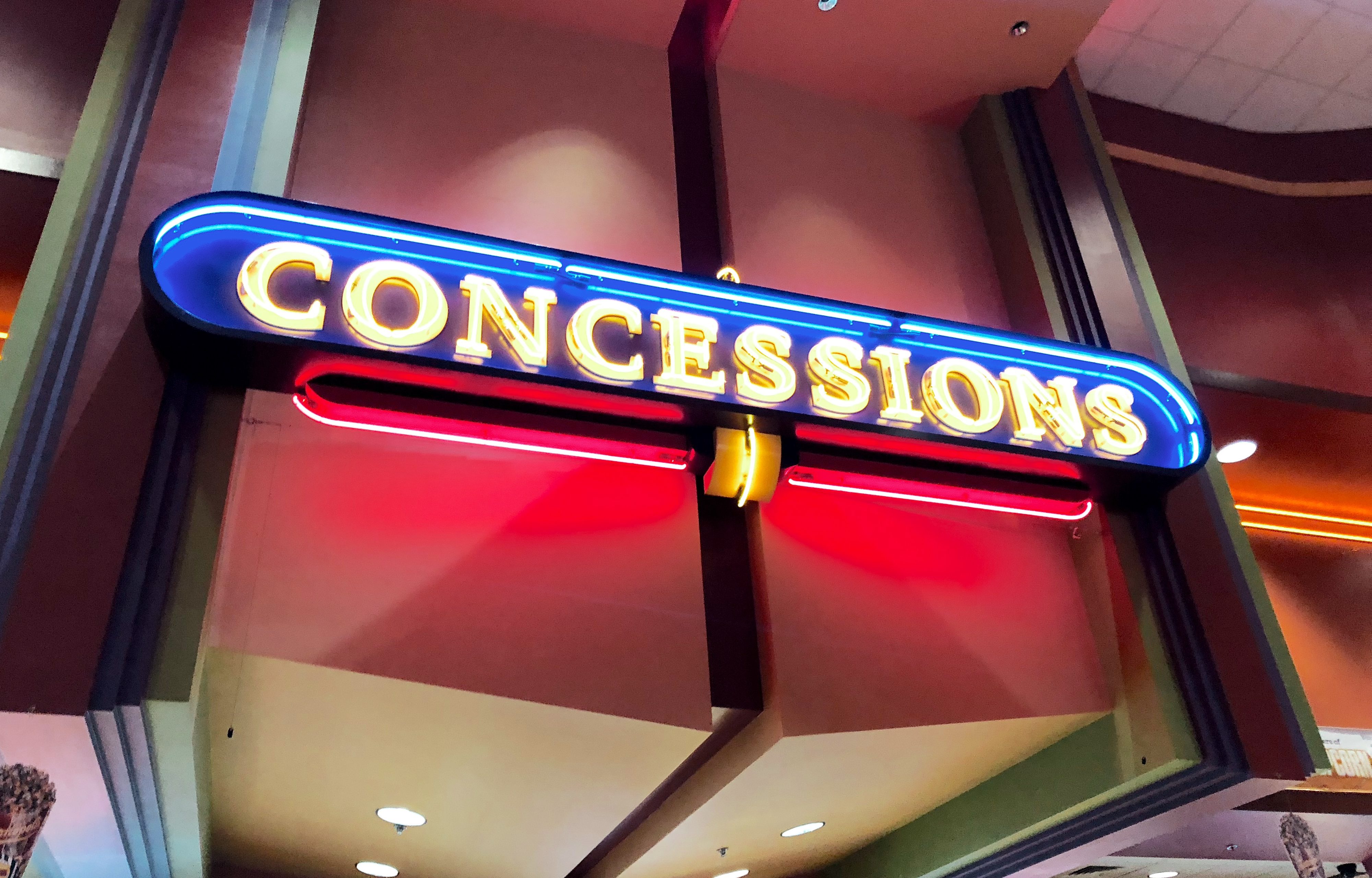 simple movie theater hacks that save money - movie concessions sign