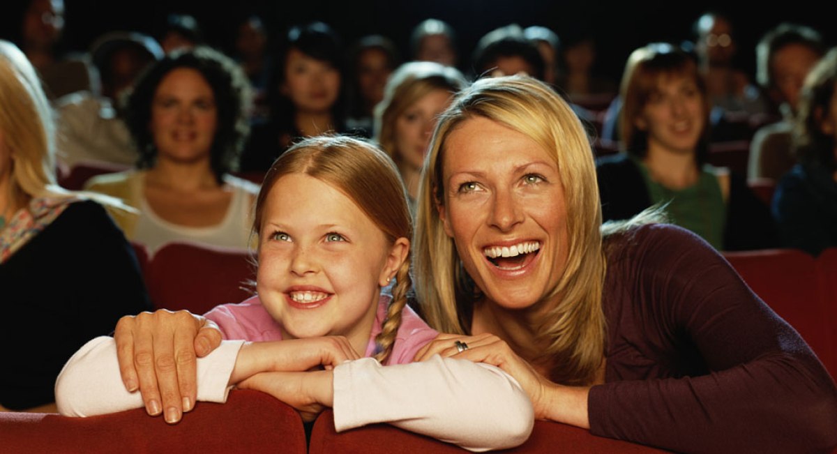 woman and girl at movies