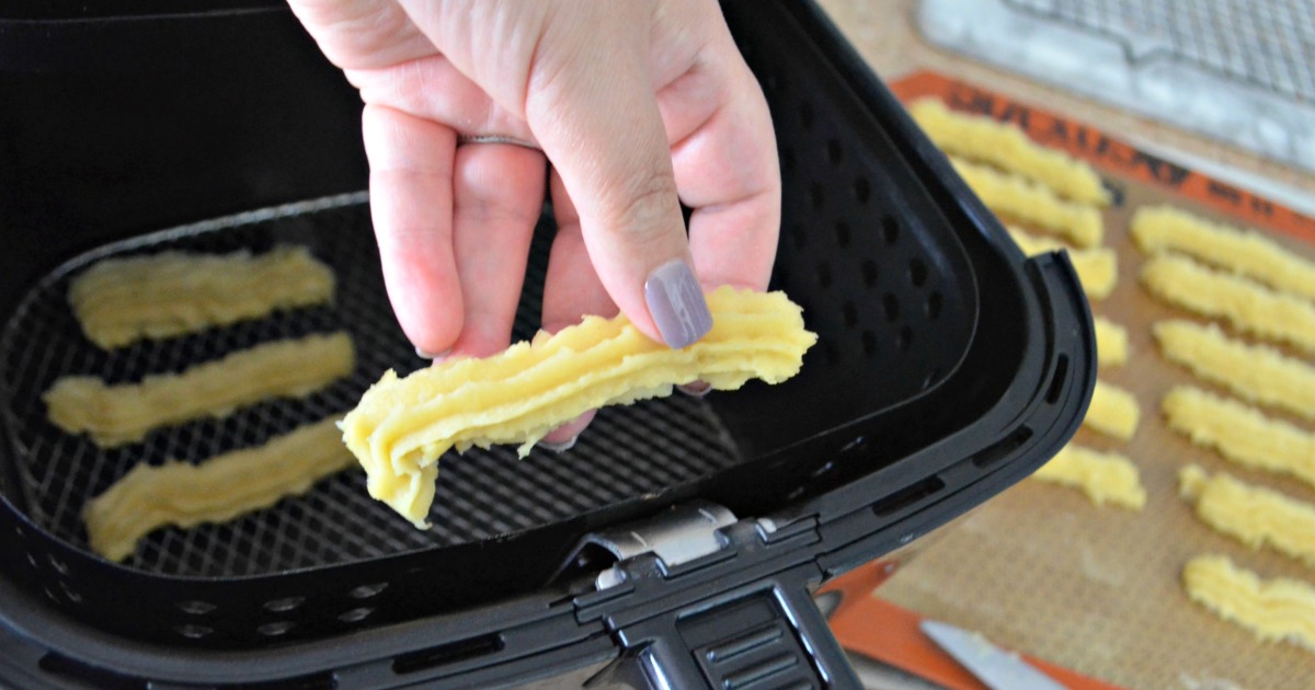 cinnamon and sugar churros from the air fryer – a piped churro prior to cooking