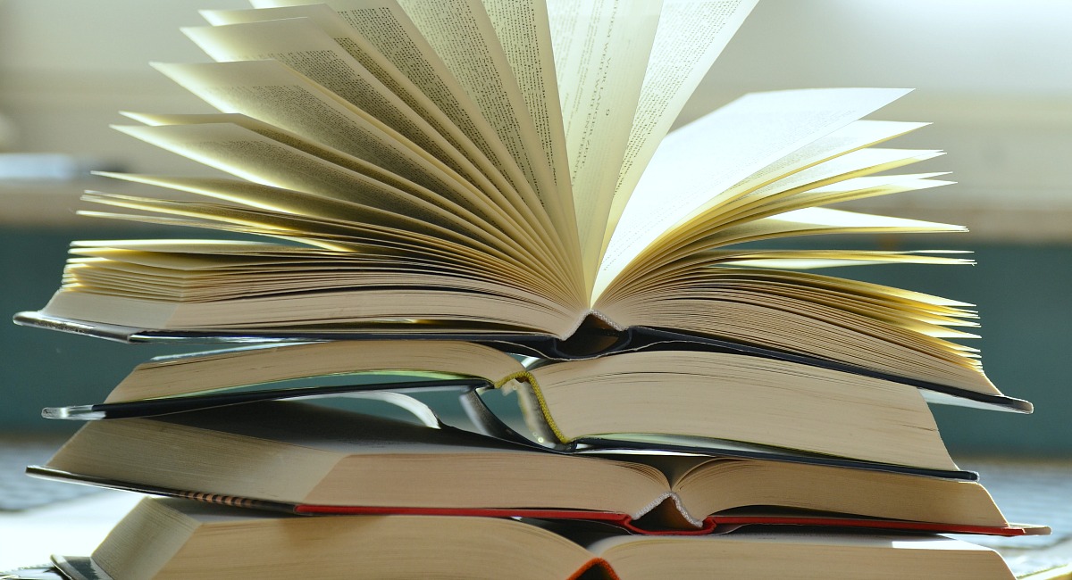 moving hacks to save money — books opened up on table