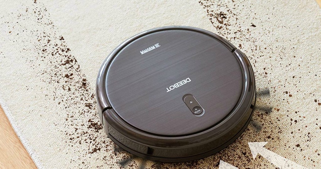 deebot vacuuming up dirt on carpet