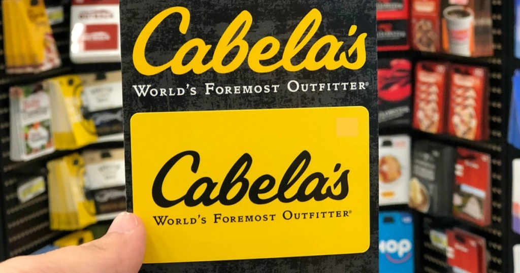 hand holding Cabela's Gift Card