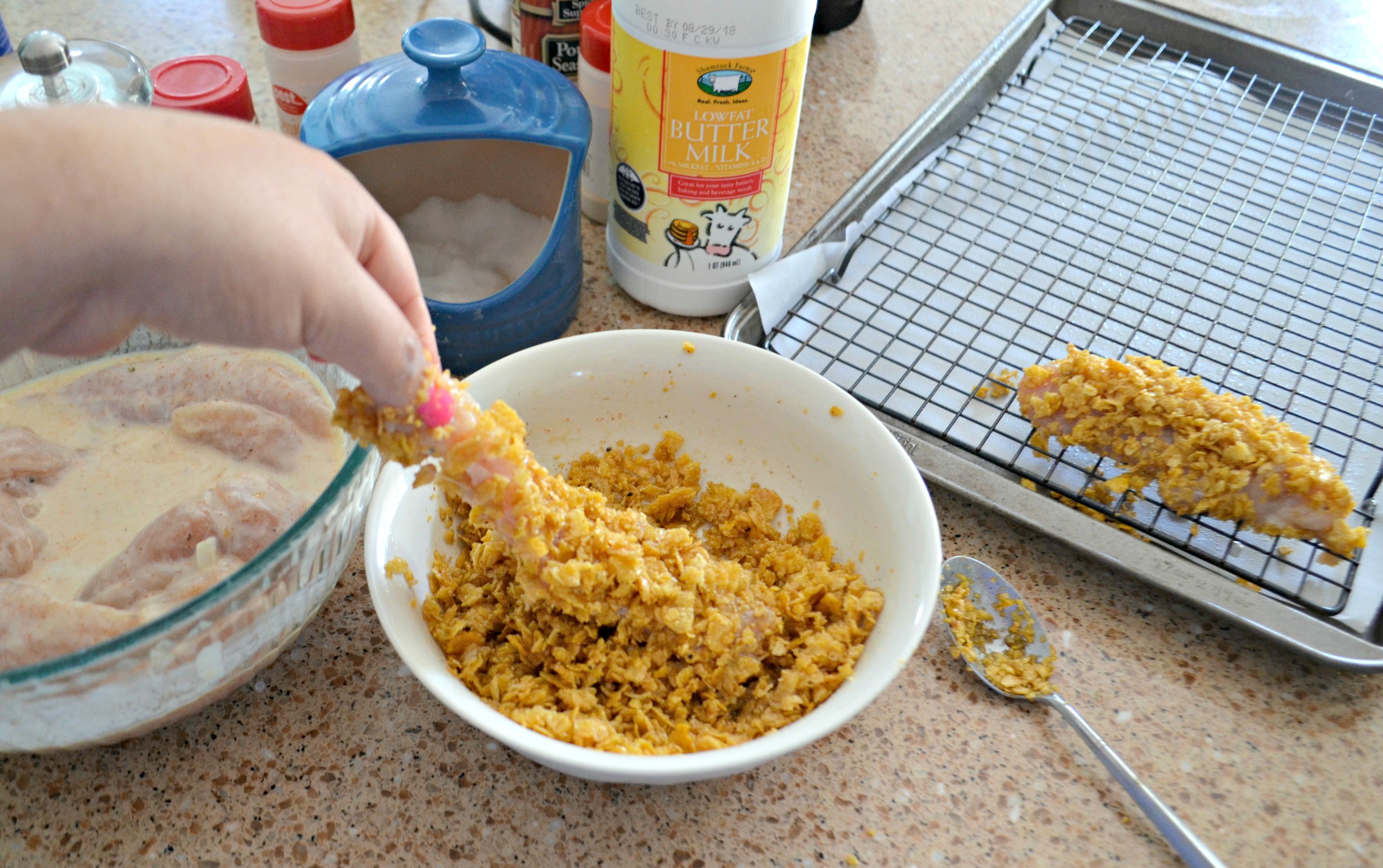 Easy Cornflake Chicken and Mini Waffles - dredging the chicken in corn flakes