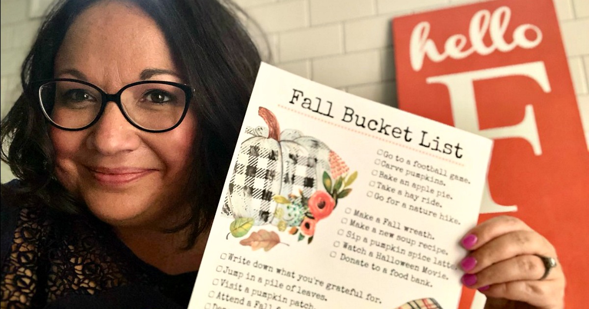 free printable fall bucket list - lina holding her bucket list