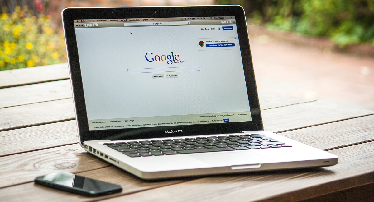 Money saving hacks and tips for booking airline flights – google homepage on macbook pro