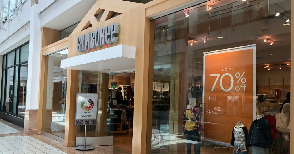 gymboree store front with sale signage