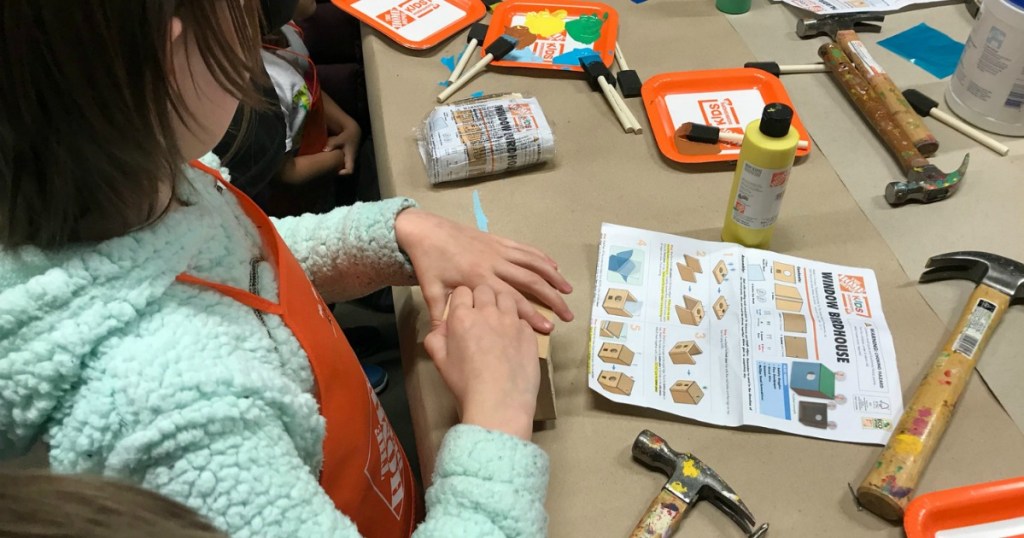 kid at home depot workshop