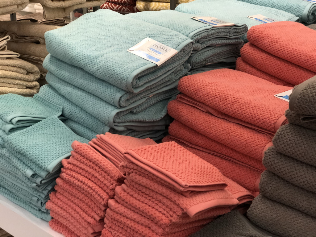 pile of bath towels in store