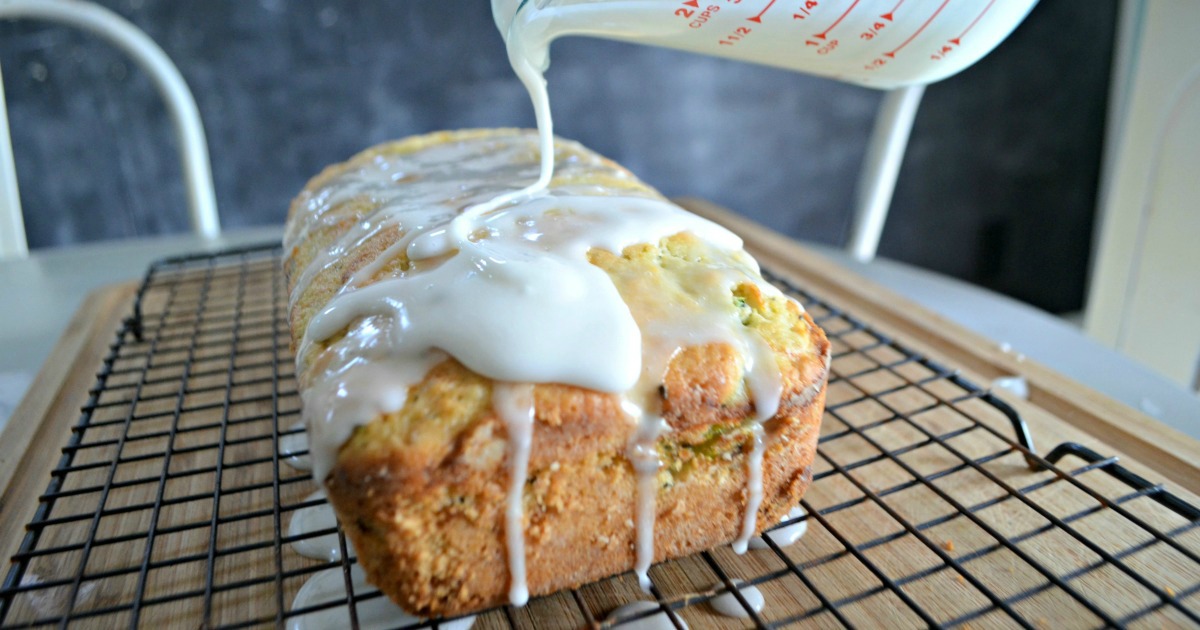 drizzle of glaze on lemon zucchini bread 