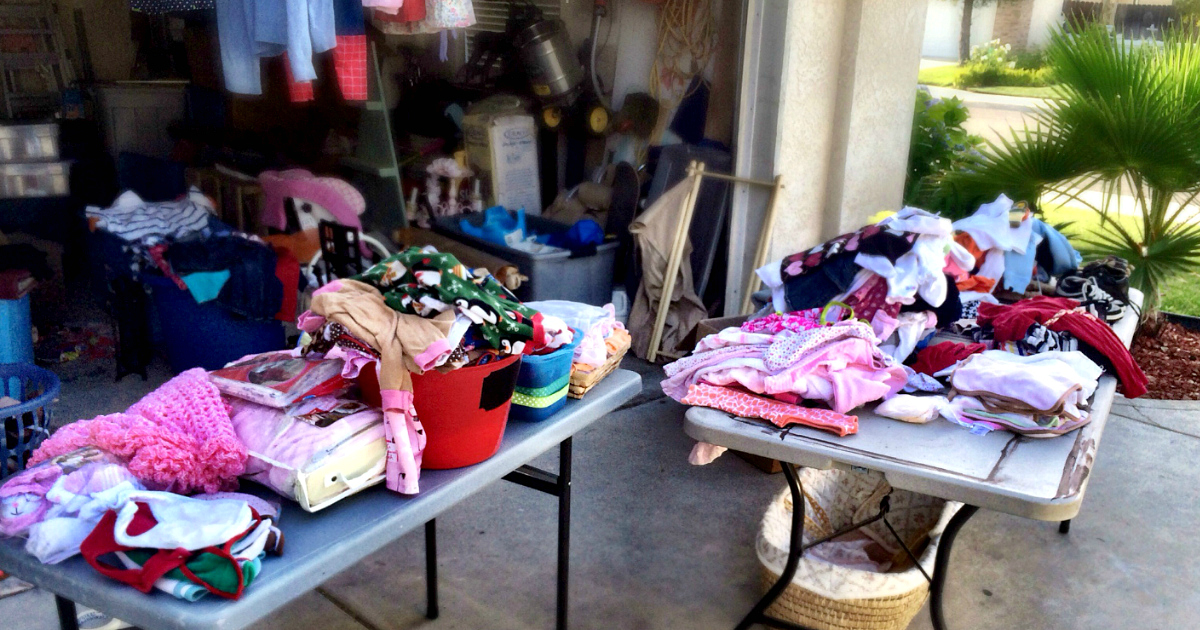 national garage sale day is upon us – tables with clothes laid out on them