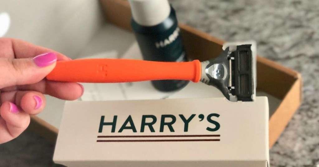 person holding Harry's Razor