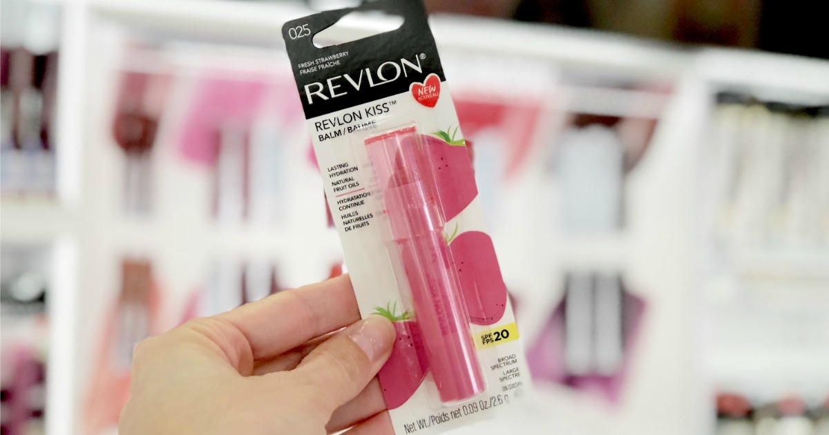 hand holding a revlon kiss balm