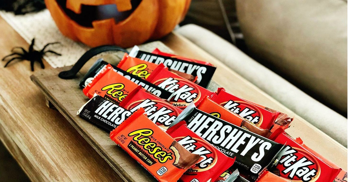 wooden tray full of full size Hershey candy bars