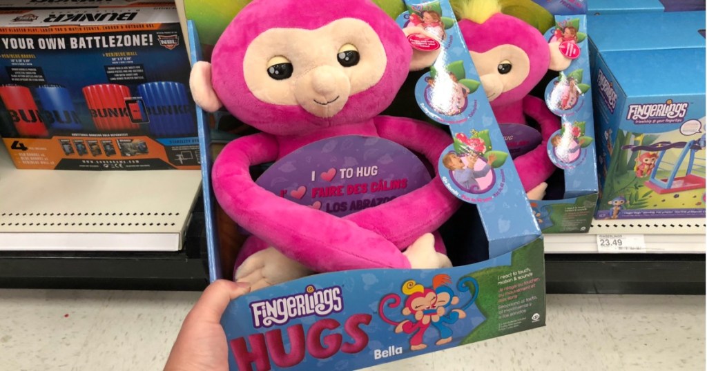 hand holding finglerlings hugs bella in store