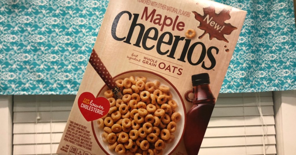 hand holding up maple cheerios