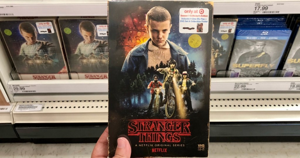 hand holding stranger things blu-ray at target