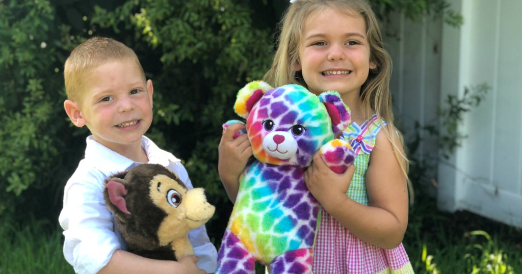 boy and girl holding Build-a-Bear