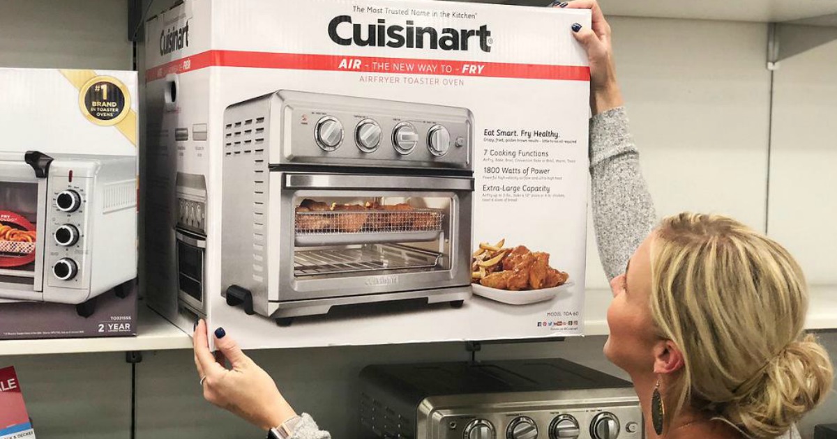 Collin grabbing Cuisinart Toaster box from store shelf