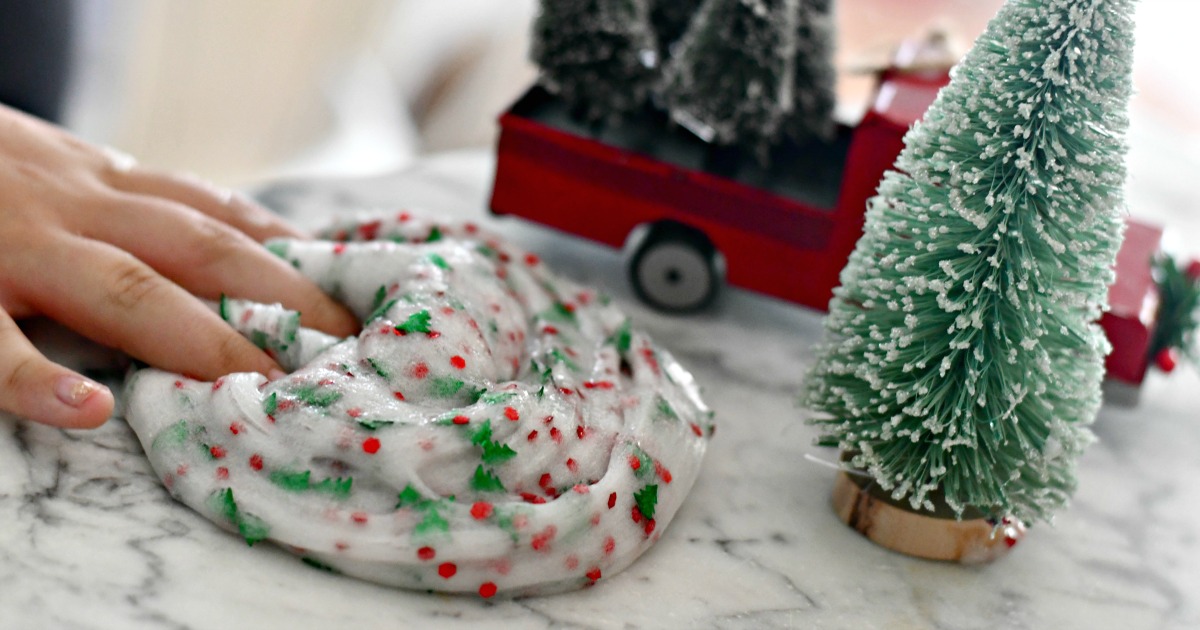 playing with the finished Christmas tree slime