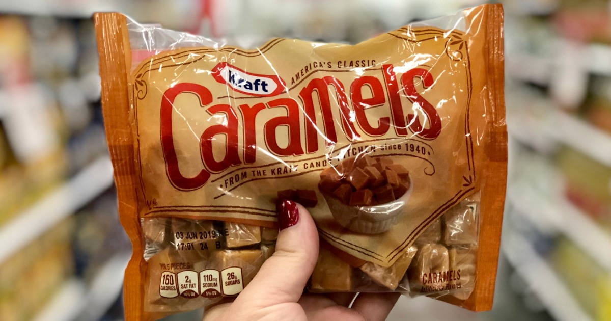 person holding kraft caramels