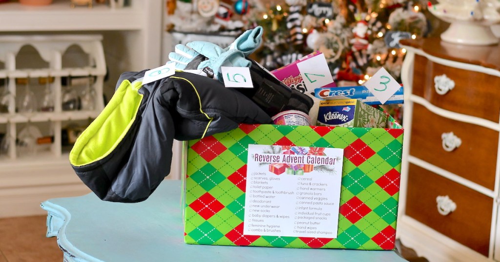 christmas box filled with reverse advent calendar stuff