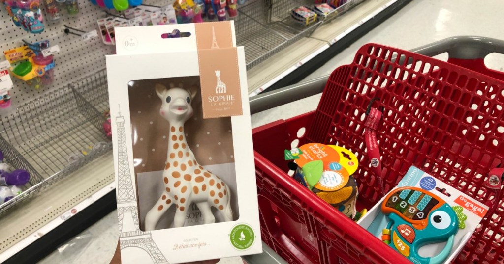 baby giraffe teether in front of target cart