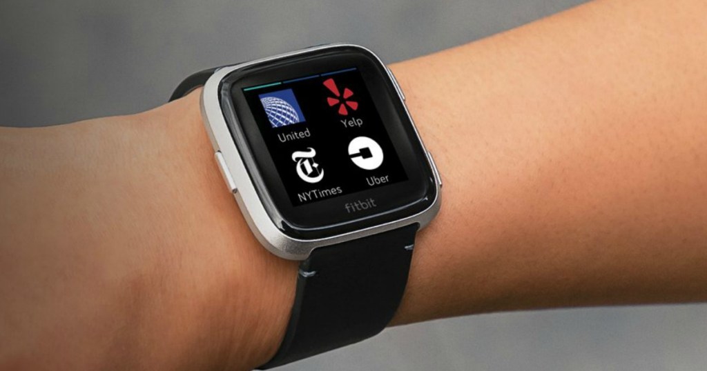 arm wearing a Fitbit Versa 2 Smartwatch