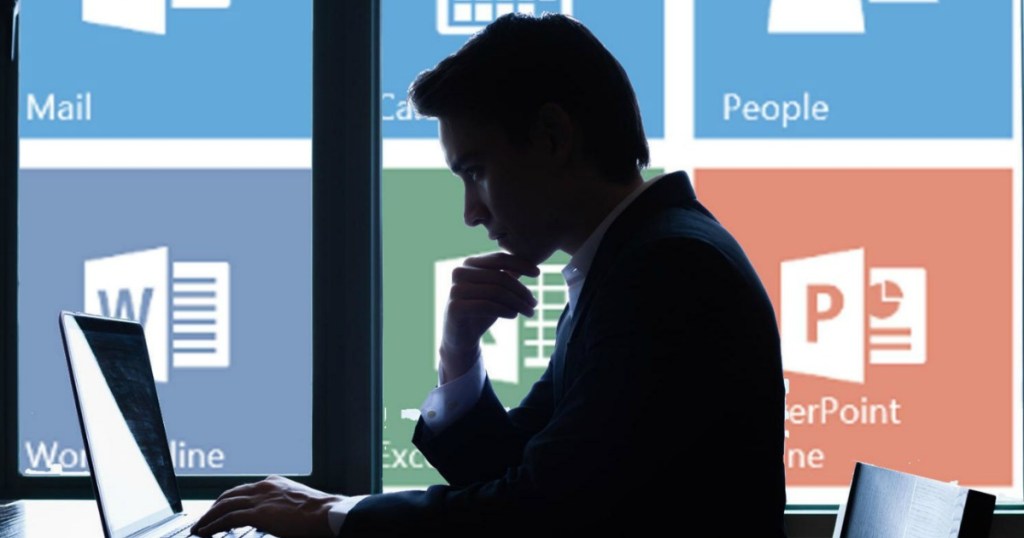 man looking at computer