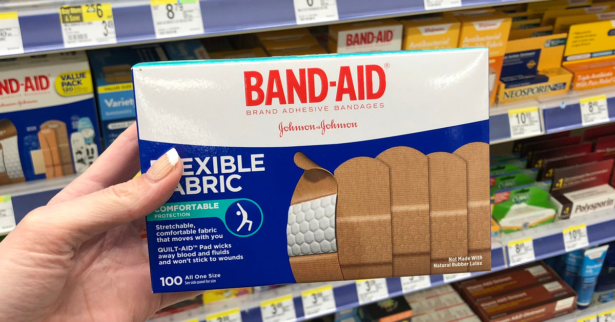 hand holding Band-Aid 100-count box