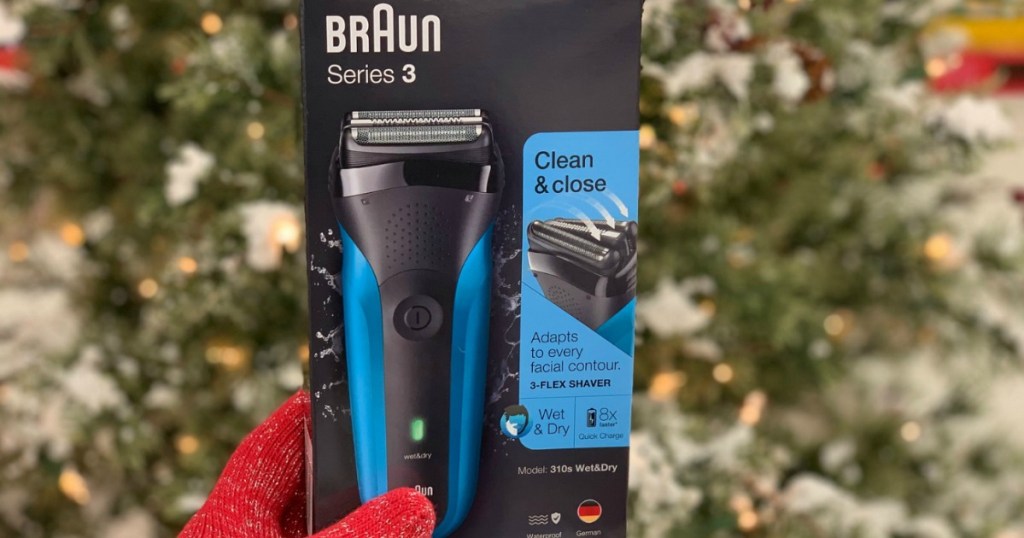 hand holding braun trimmer