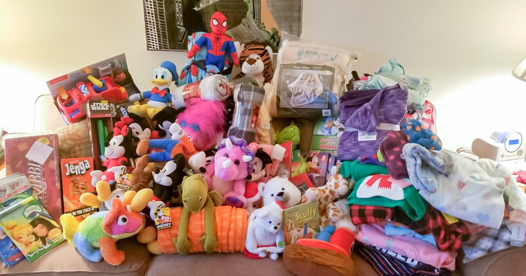 reader giving back — stuffed animal pile from tree trimming party for project night night