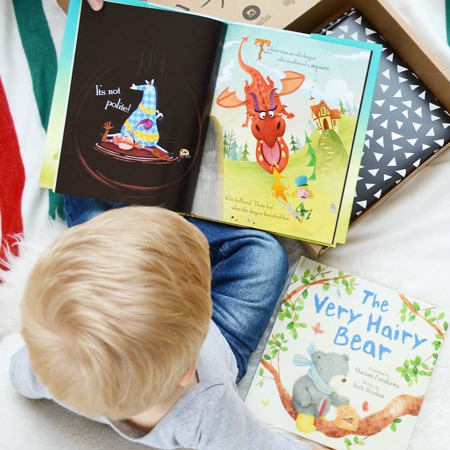 lillypost kids books subscription box promo code deal – young boy reading a book