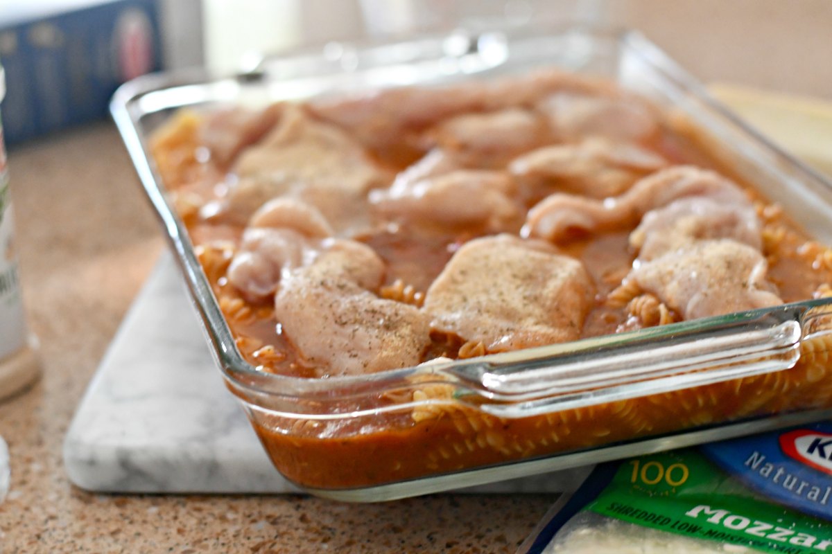 chicken parmesan bake one-pan meal – ingredients in the baking dish pre-bake