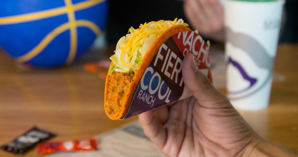 hand holding taco
