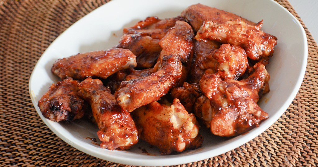 plate with baked honey bbq chicken wings