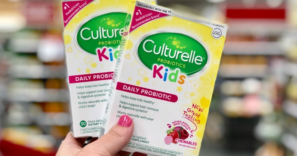 hand holding 2 culturelle kids products